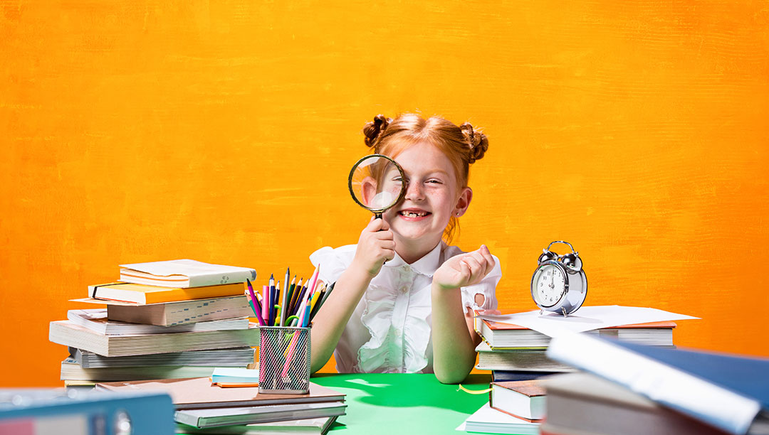 Education Fair Brisbane 2025 girl with books and magnifying glass searching for best brisbane schools